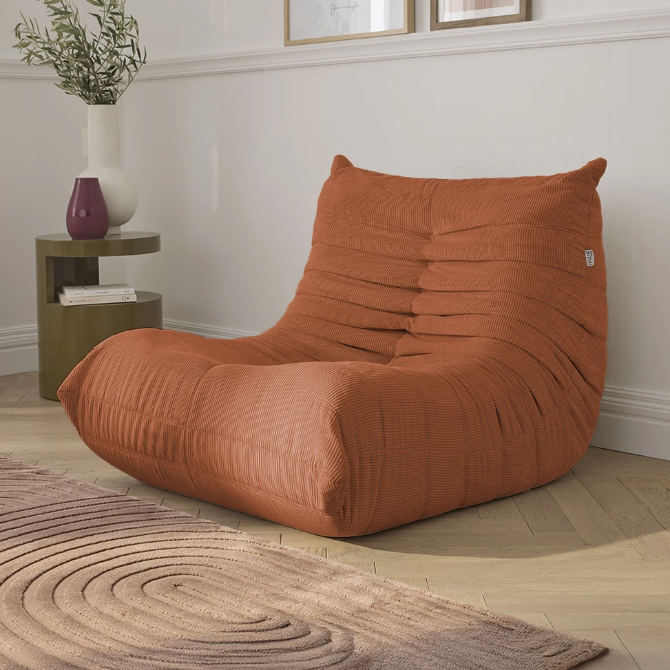 Fauteuil en velours côtelé terra